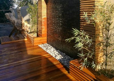 Contemporary garden water feature with pebbles and cascading water, installed by Creative Landscapes in Durban
